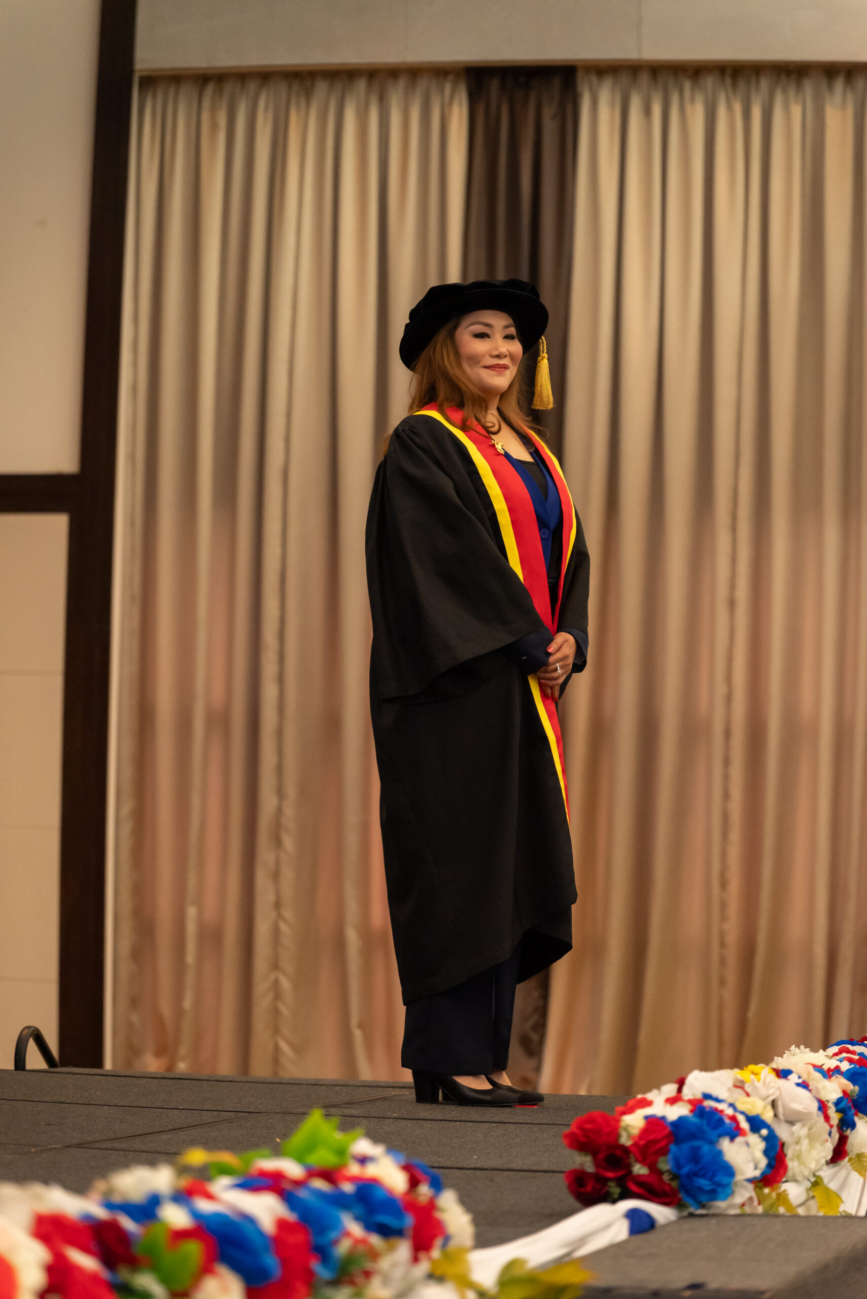 Graduate celebrating academic achievement in Kuala Lumpur