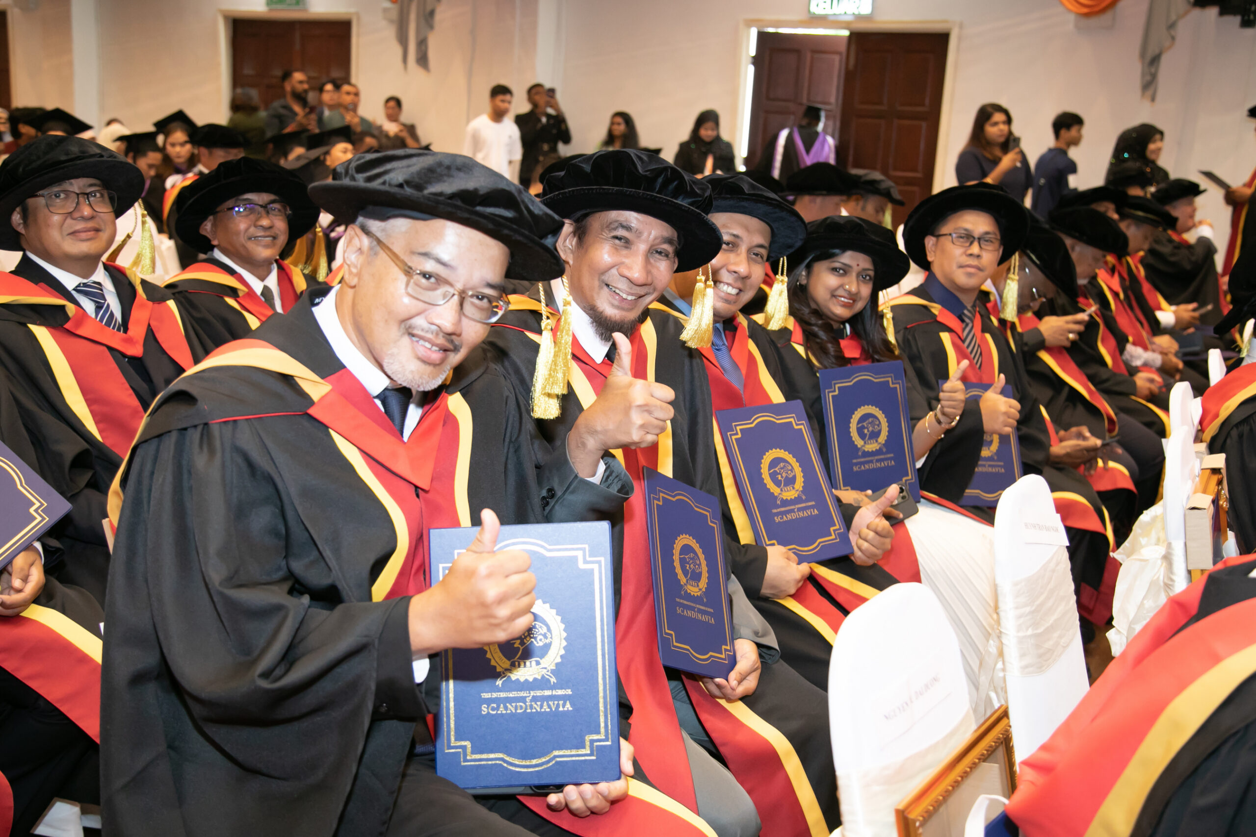 IBSS graduate celebrating academic achievement