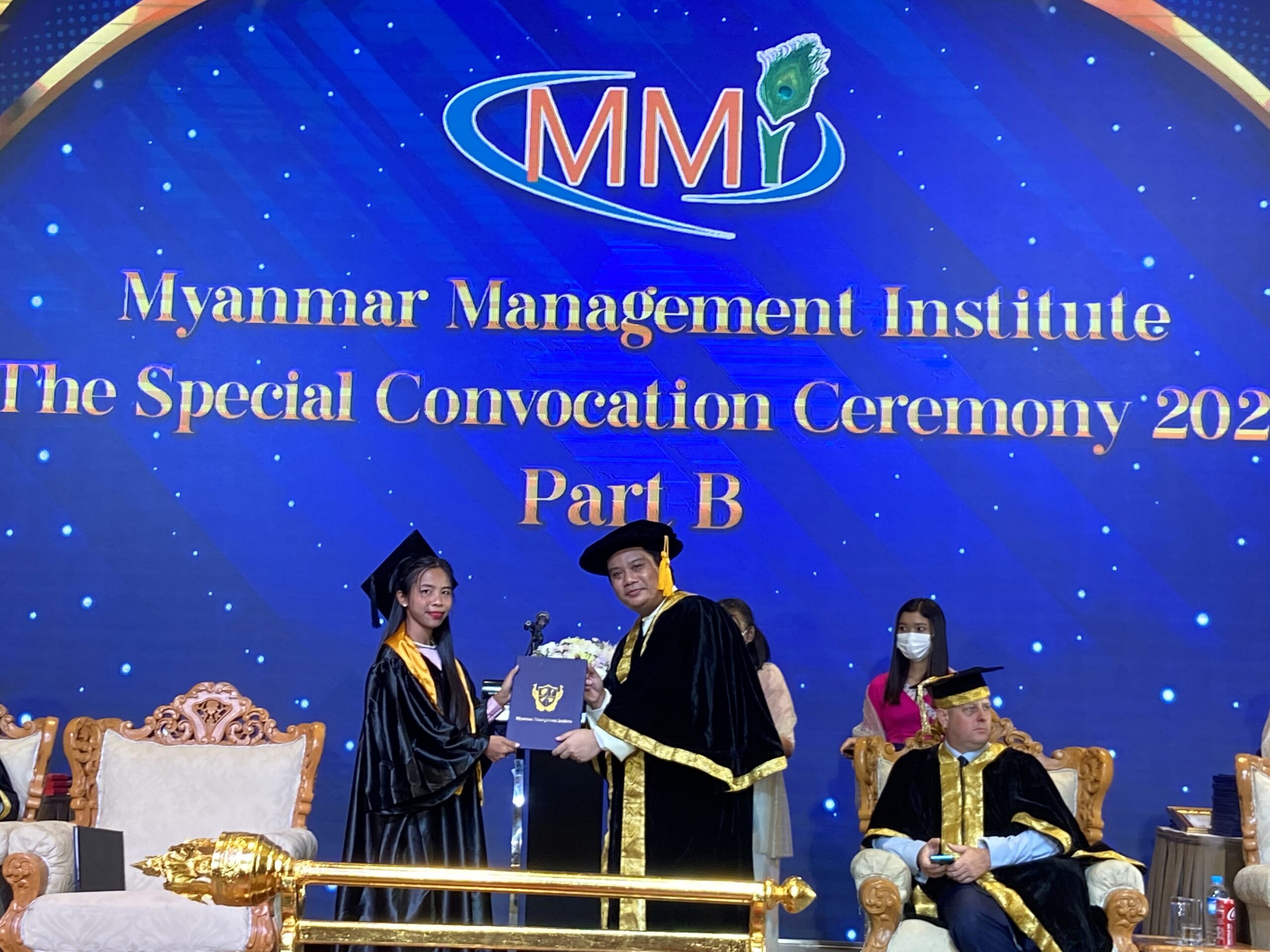 MMI graduates on stage during the 2023 graduation
