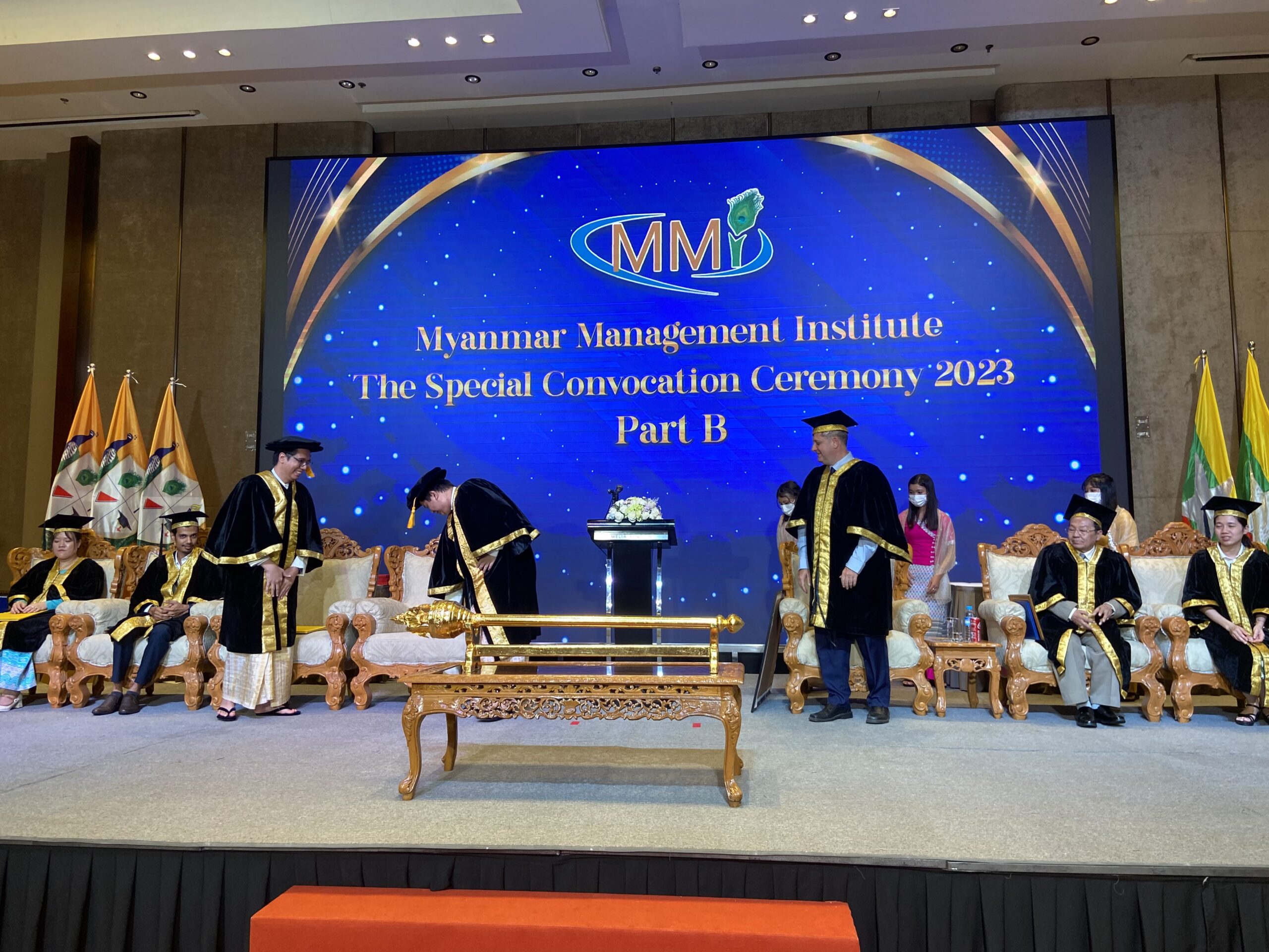 Graduates on stage during the MMI Graduation ceremony