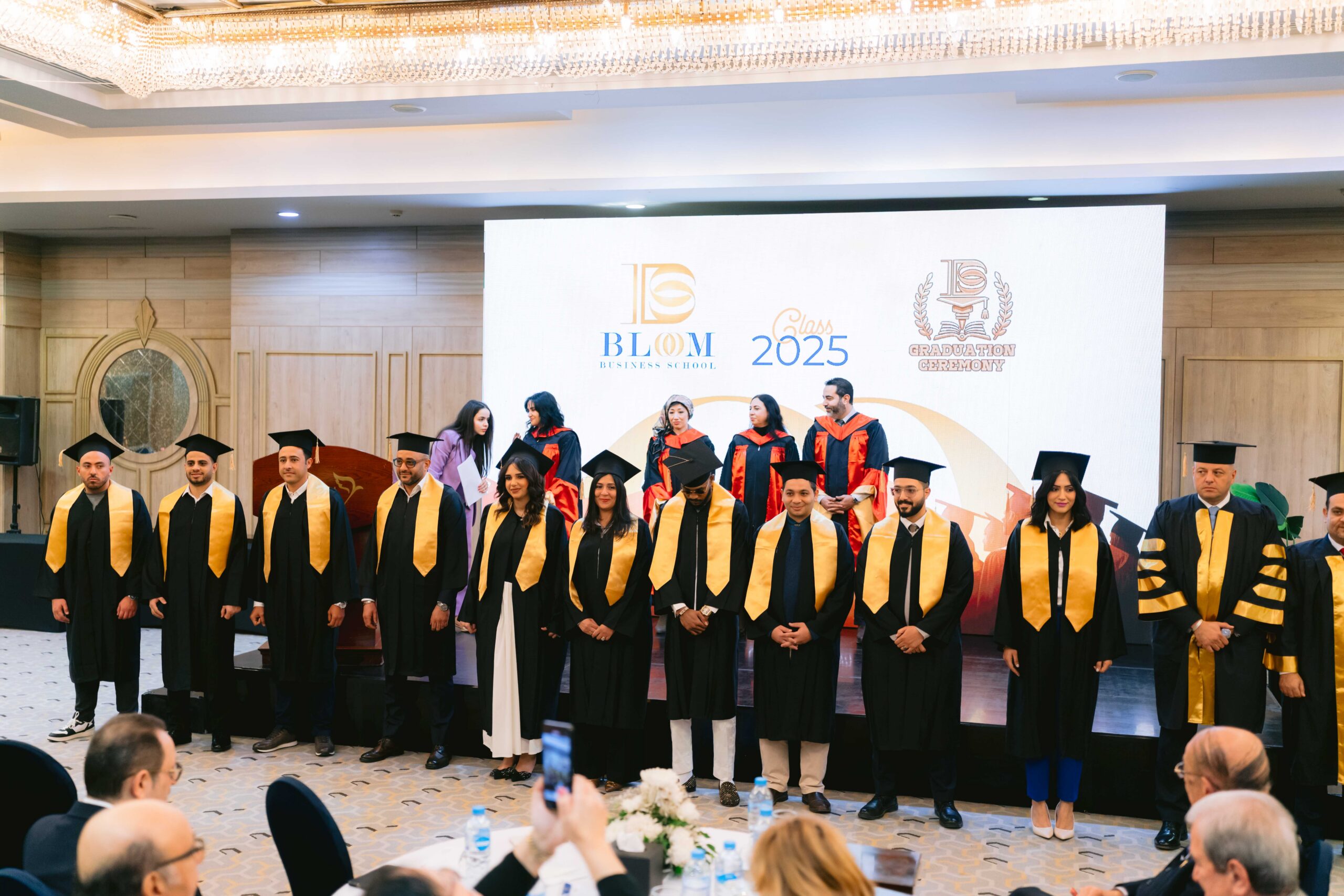 Graduates and guests celebrating together