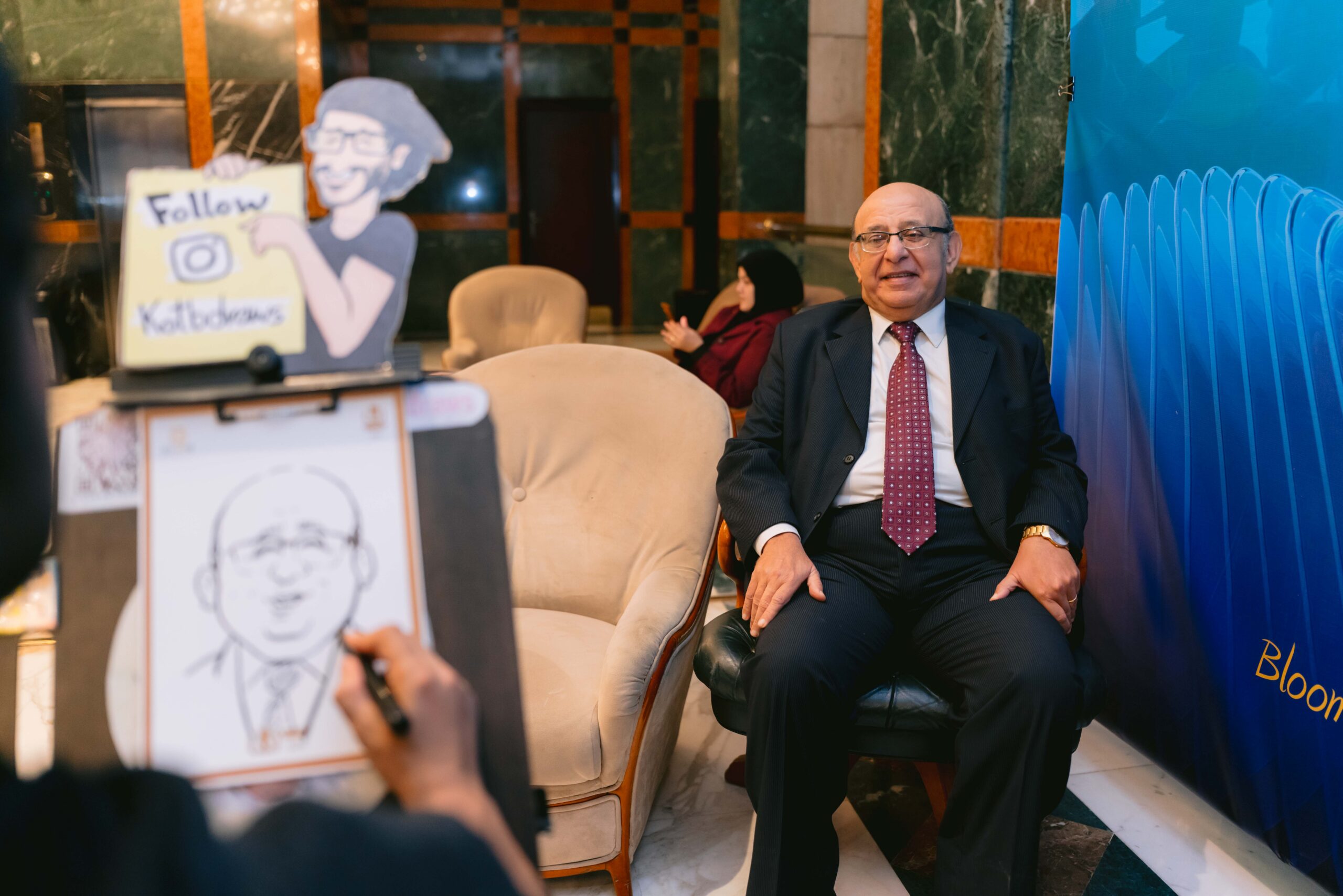 Live caricature artist at the Bloom Business School and IBSS Graduation 2025